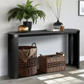 Console nera con gambe curve, piano ovale, montaggio a 1 persona