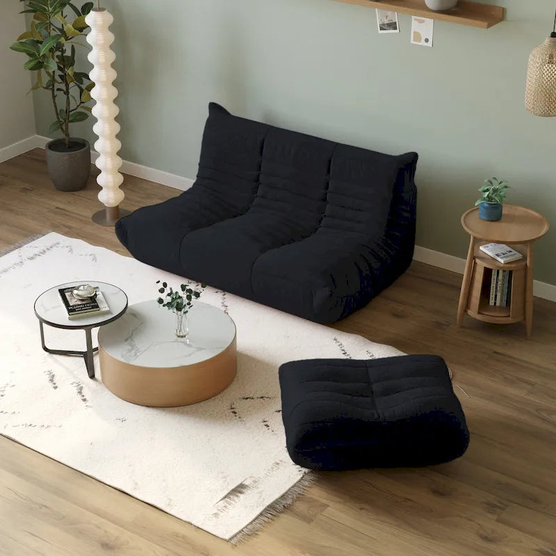 Divano da terra in tessuto Teddy nero – Singolo / Divanetto / 3 posti / Ottomana